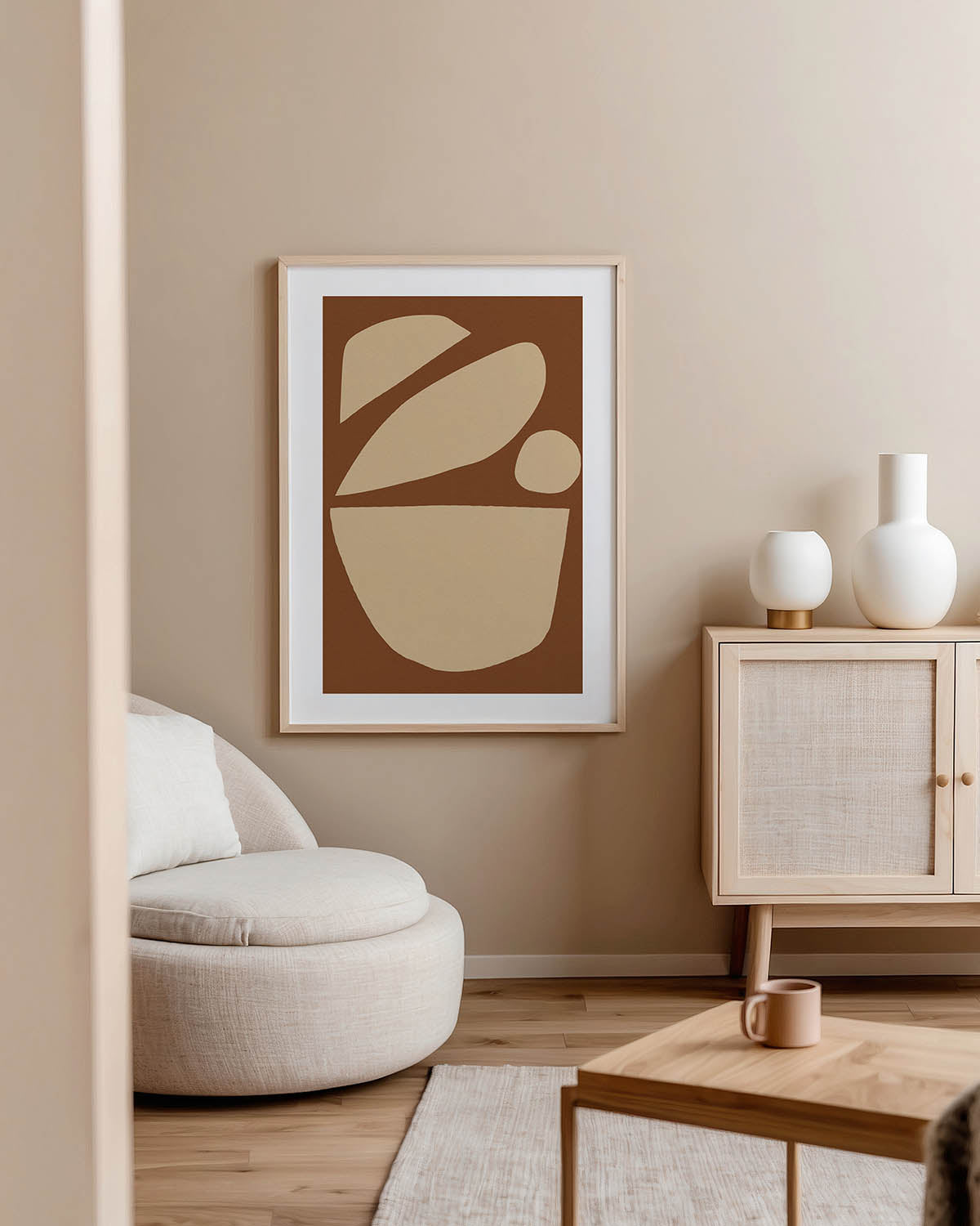 Abstract minimalist poster with organic beige shapes on a warm brown background, creating an earthy, modern look. Ideal wall art for bohemian, Scandinavian, or contemporary decor styles.